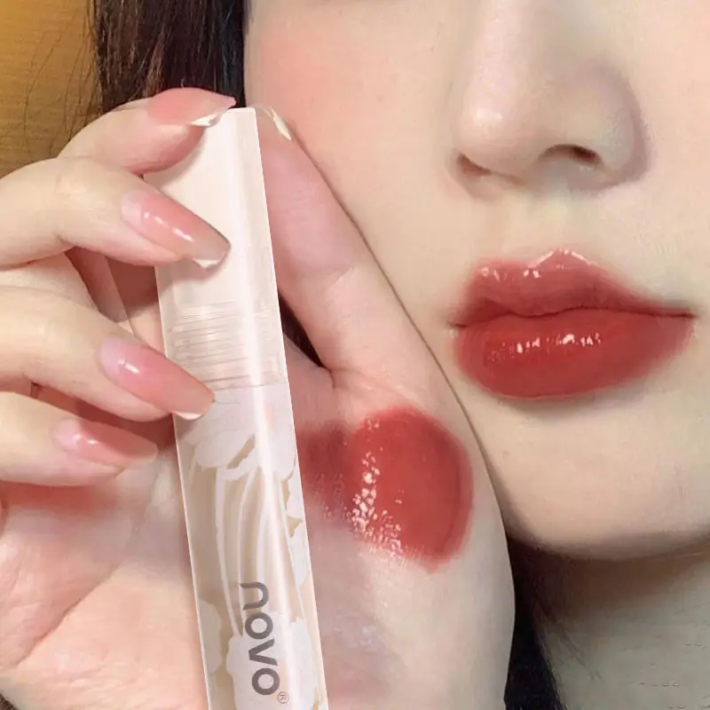 Novo Lip Lacquer Water Light Mirror Non-Fading No Stain on Cup Matte Finish Mouth Red Lip Mud Waterproof Lip Glaze Moisturising
Novo Lip Lacquer Water Light Mirror Non-Fading No Stain on Cup Matte Finish Mouth Red Lip Mud Waterproof Lip Glaze Moisturising