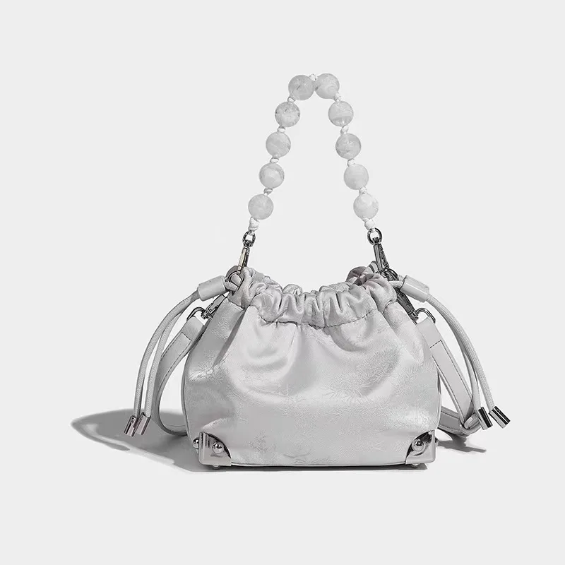 2024 New Niche Designer Luxury Retro Beaded Handbag Exquisite And Versatile Pleated Bucket Bag Casual And Simple Shoulder Bag
2024 New Niche Designer Luxury Retro Beaded Handbag Exquisite And Versatile Pleated Bucket Bag Casual And Simple Shoulder Bag
