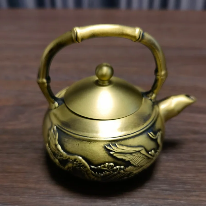 Pure copper small teapot with pure copper teapot handle teapot wine jug metal crafts
Pure copper small teapot with pure copper teapot handle teapot wine jug metal crafts