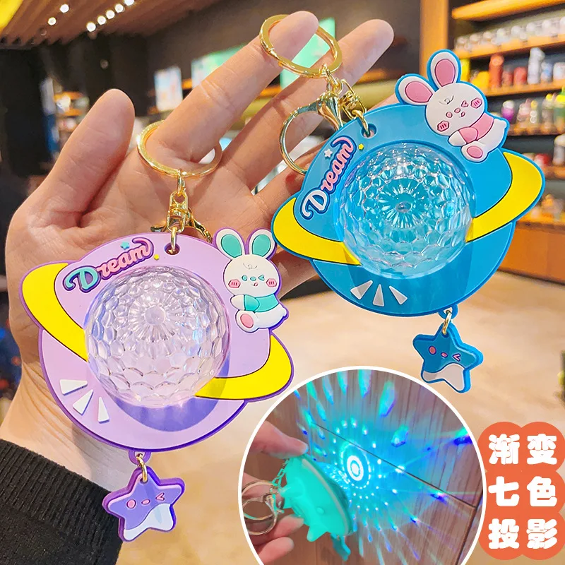 

Creative Atmosphere Dazzling Ambient Light Starry Rabbit Flying Dish Projection Light Key Chain Full Star Night Light Pendant