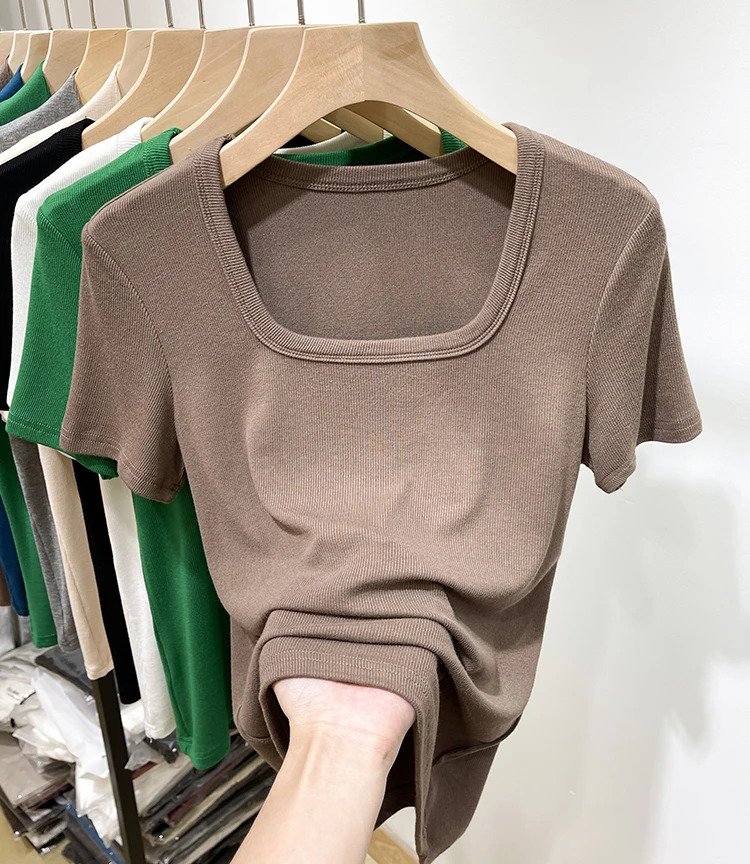 تي شيرت نسائي جديد لعام 2024 بقصة ضيقة وأكمام قصيرة، ياقة مربعة مع تصميم خيوط، أنيق للربيع والصيف، ملابس كاجوال عصرية تي شيرت نسائي جديد لعام 2024 بقصة ضيقة وأكمام قصيرة، ياقة مربعة مع تصميم خيوط، أنيق للربيع والصيف، ملابس كاجوال عصرية