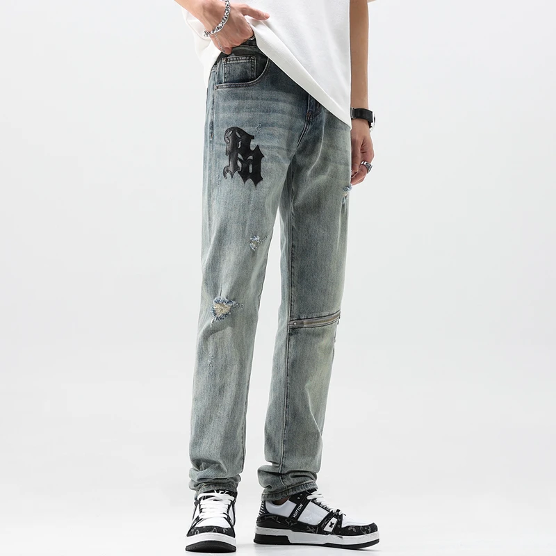 Ripped Men's Jeans Leather Patched Trousers Mid Waist Letter Embroidered Male's Causal Pants Zipper Spliced Denim Clothing
Ripped Men's Jeans Leather Patched Trousers Mid Waist Letter Embroidered Male's Causal Pants Zipper Spliced Denim Clothing