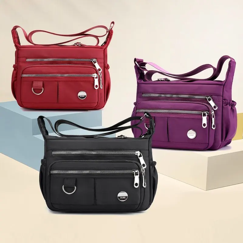 Однотонные нейлоновые сумки через плечо на молнии, Женская водонепроницаемая сумка для покупок с несколькими карманами, вместительная сумка-мессенджер средней длины для мам, кошелек
Однотонные нейлоновые сумки через плечо на молнии, Женская водонепроницаемая сумка для покупок с несколькими карманами, вместительная сумка-мессенджер средней длины для мам, кошелек