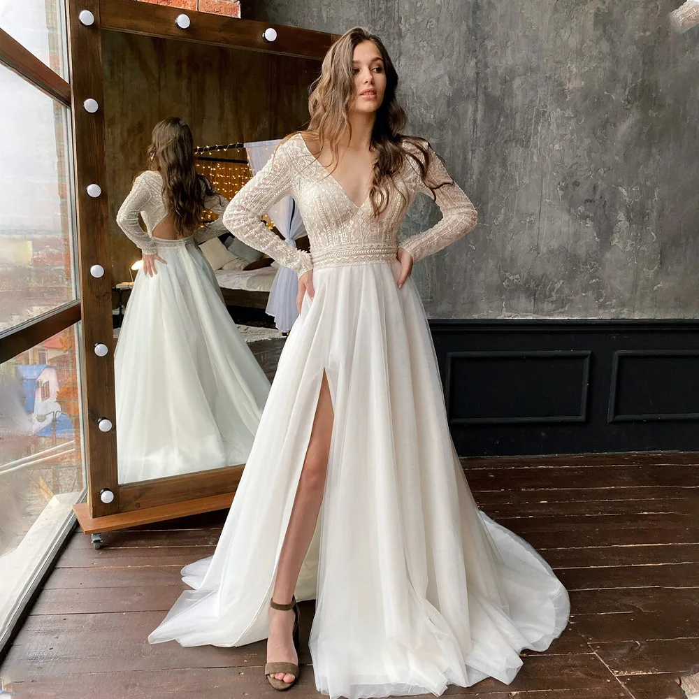 Glamorous Long Sleeves V-neck Lace Boho Beach A Line Wedding Dresses Side Slit Bridal Grown 2024 Rode De Morrie
Glamorous Long Sleeves V-neck Lace Boho Beach A Line Wedding Dresses Side Slit Bridal Grown 2024 Rode De Morrie
