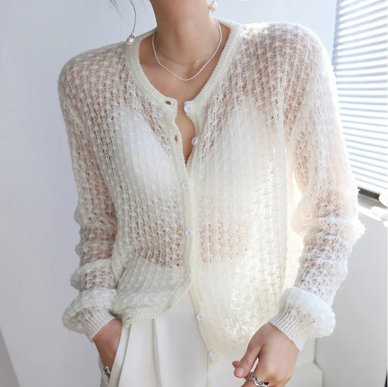 2024 Autumn Women's Cardigan Retro French Gentle Wind Fashion Wild Mohair Crochet Hollow Breathable Thin Knit Cardigan Sweater
2024 Autumn Women's Cardigan Retro French Gentle Wind Fashion Wild Mohair Crochet Hollow Breathable Thin Knit Cardigan Sweater