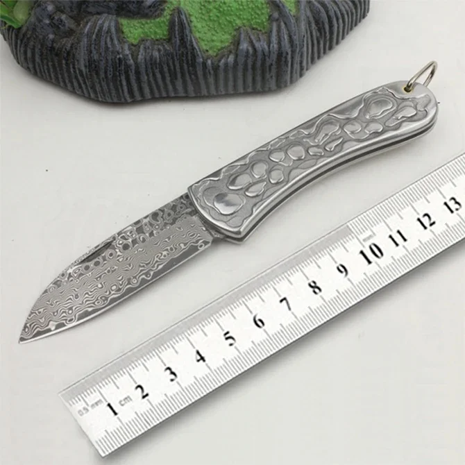 Mini Folding knife imports VG10 Damascus steel blade blacksmithing steel handle outdoor Camping, fishing, and climbing EDC tool
Mini Folding knife imports VG10 Damascus steel blade blacksmithing steel handle outdoor Camping, fishing, and climbing EDC tool