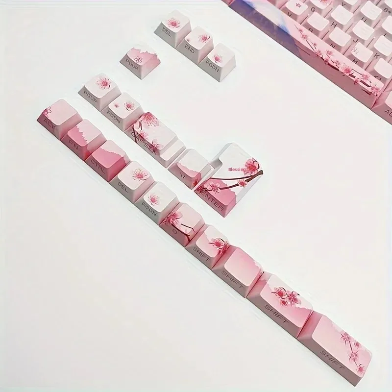 Cute pink mechanical keyboard keycaps with cherry blossom design