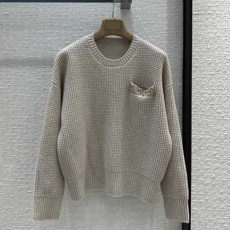 2023 High Quality Fashion Lazy Style Temperament Elegant Heavy Work Bead Pocket Loose Knitted Cashmere Sweater
2023 High Quality Fashion Lazy Style Temperament Elegant Heavy Work Bead Pocket Loose Knitted Cashmere Sweater