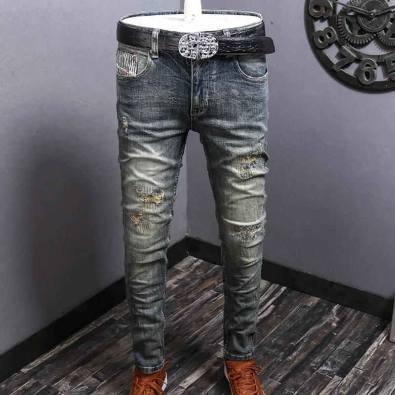 Джинсы мужские рваные в стиле хип-хоп, дизайнерские узкие брюки из денима, роскошные синие джинсы в стиле панк-рок, брендовые штаны, Супермен
Джинсы мужские рваные в стиле хип-хоп, дизайнерские узкие брюки из денима, роскошные синие джинсы в стиле панк-рок, брендовые штаны, Супермен