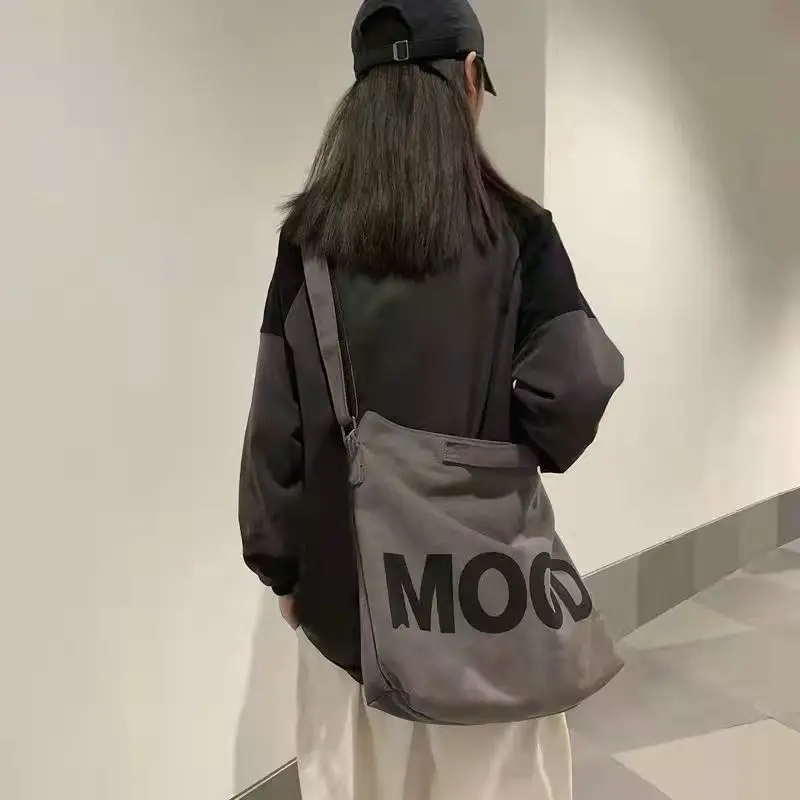Bag Women's Popular High Capacity Student Canvas Bag Simple and Versatile Crossbody Backpack Lazy Couple Bag
Bag Women's Popular High Capacity Student Canvas Bag Simple and Versatile Crossbody Backpack Lazy Couple Bag
