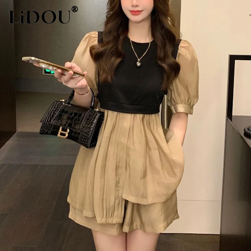 Summer New Fake Two Piece Patchwork Short Sleeve Pullover Shirt Wide Leg Shorts Set Women Loose All-match Suit Female Clothes
Summer New Fake Two Piece Patchwork Short Sleeve Pullover Shirt Wide Leg Shorts Set Women Loose All-match Suit Female Clothes
