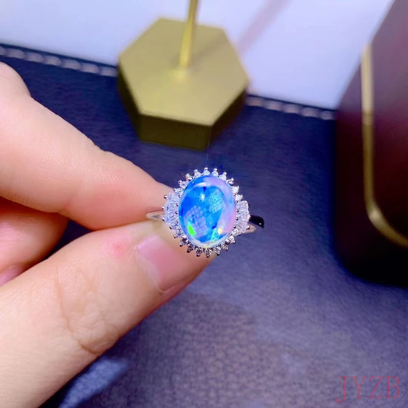 

Natural opal woman rings change fire color mysterious 925 silver adjustable size 8*10MM