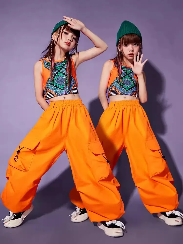 

Летняя детская одежда для выступлений в стиле хип-хоп, жилет, оранжевые брюки, свободная сценическая одежда для уличных танцев, одежда для девочек в стиле K-POP для джазовых танцев