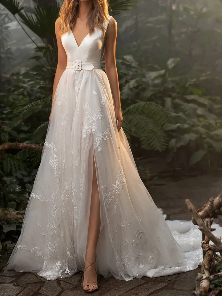White Appliques Wedding Dresses A-Line Sleeveless Deep V-Neck Backless Tulle Bridal Gowns Illusion Belt Robe De Mariée W10367
White Appliques Wedding Dresses A-Line Sleeveless Deep V-Neck Backless Tulle Bridal Gowns Illusion Belt Robe De Mariée W10367