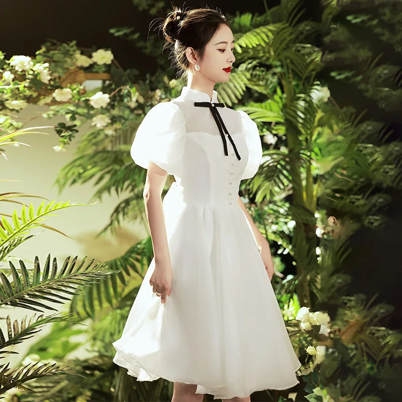 White Bubble Sleeve Graduation Dress Women Stand Neck Bowknot Applique Prom Gown Elegant Simple A-line Evening Dresses
White Bubble Sleeve Graduation Dress Women Stand Neck Bowknot Applique Prom Gown Elegant Simple A-line Evening Dresses