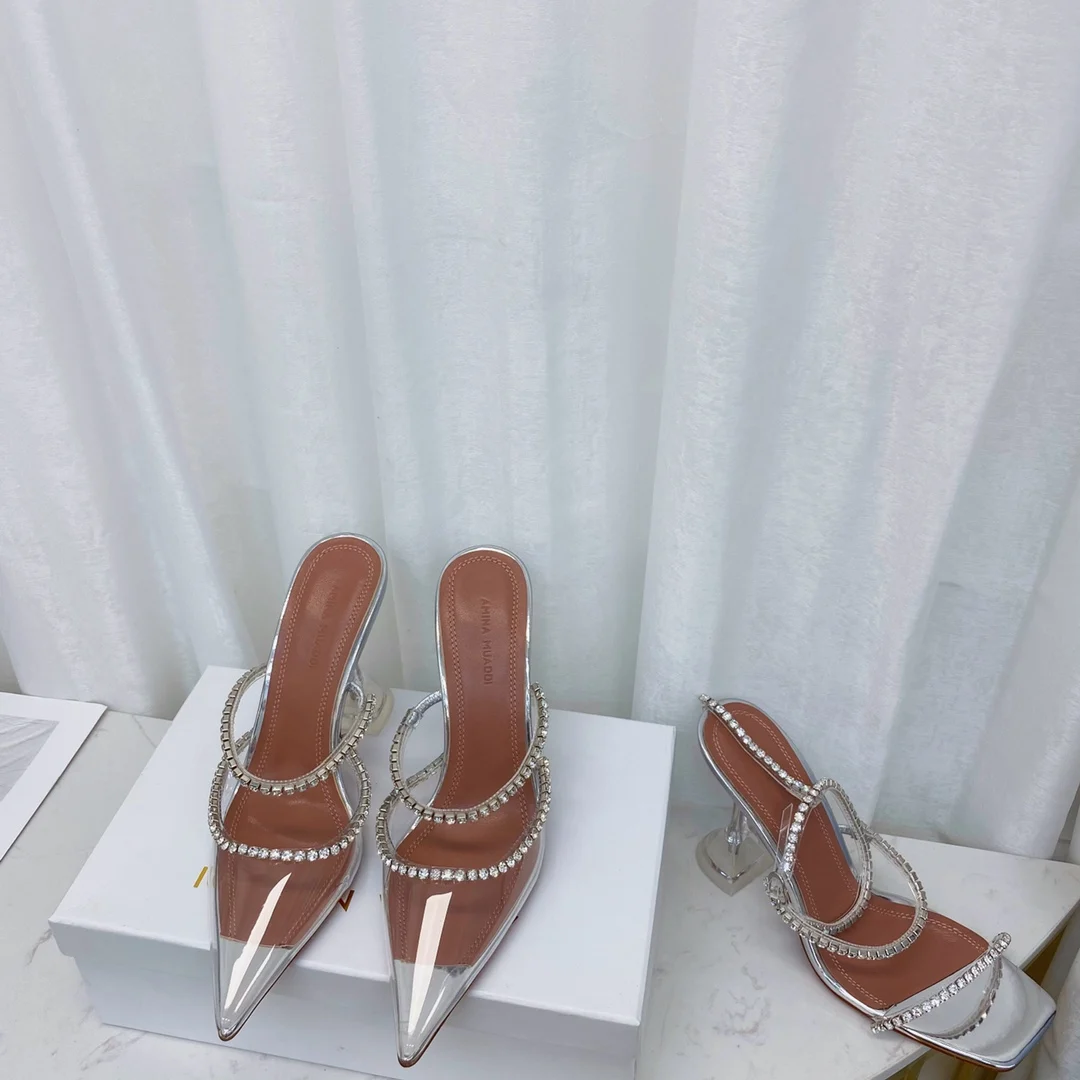 

Amina Muaddi Gilda Embellished Heeled Glitter Mules pointed toe luxury rhinestone pvc high heel stiletto slippers sandals woman