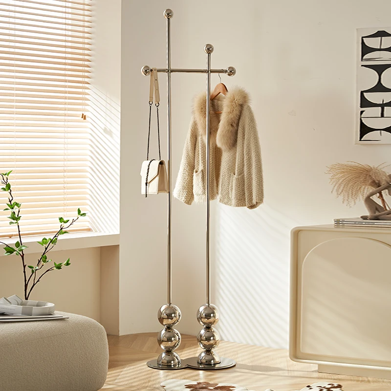 Nordic stainless steel coat and hat rack, living room, bedroom, storage,luxurious, and medieval hanging clothes rack
Nordic stainless steel coat and hat rack, living room, bedroom, storage,luxurious, and medieval hanging clothes rack