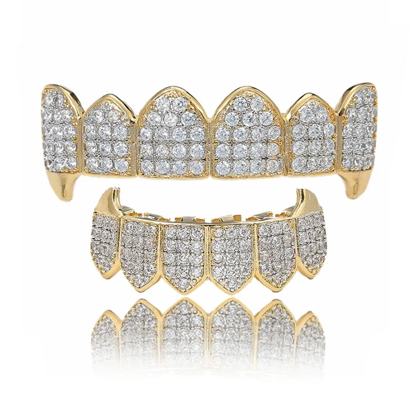 Hiphop Iced Zircon Vampire Tooth Grillz for Women Men Body Piercing Jewelry Gold Cubic Zirconia Teeth Grills Bottom Top Cap Set
Hiphop Iced Zircon Vampire Tooth Grillz for Women Men Body Piercing Jewelry Gold Cubic Zirconia Teeth Grills Bottom Top Cap Set