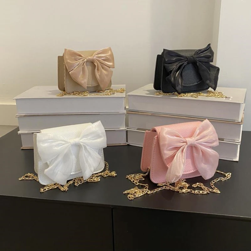 Fashion Elegant Big Bow Design PU Leather Women Shoulder Crossbody Bag Simple Casual Small Square Bag
Fashion Elegant Big Bow Design PU Leather Women Shoulder Crossbody Bag Simple Casual Small Square Bag