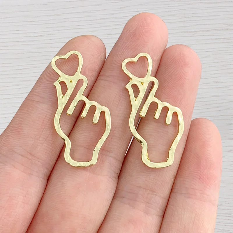 10 x Gold Tone Hollow Open Love Heart Hand Sign Charms Pendants for DIY Earrings Necklace Bracelet Jewelry Making Accessories
10 x Gold Tone Hollow Open Love Heart Hand Sign Charms Pendants for DIY Earrings Necklace Bracelet Jewelry Making Accessories