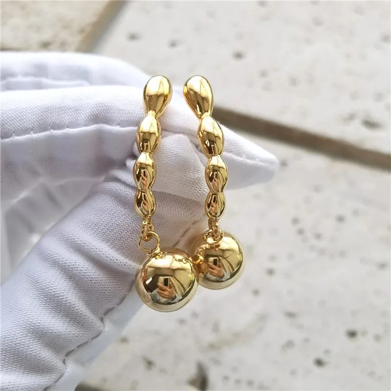 Simple ins golden balls earrings vintage designer elegant women summer waterdrop classic long piercing
Simple ins golden balls earrings vintage designer elegant women summer waterdrop classic long piercing