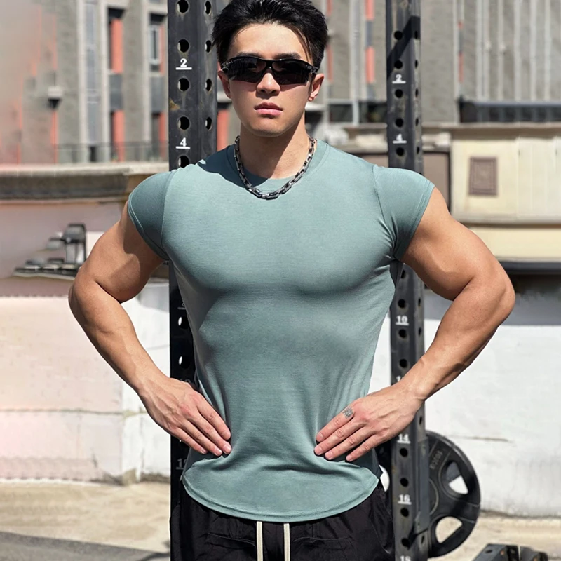 

Summer new cotton semi-short-sleeved T-shirt men's jacket casual solid color tight running exercise fitness sports men's wear