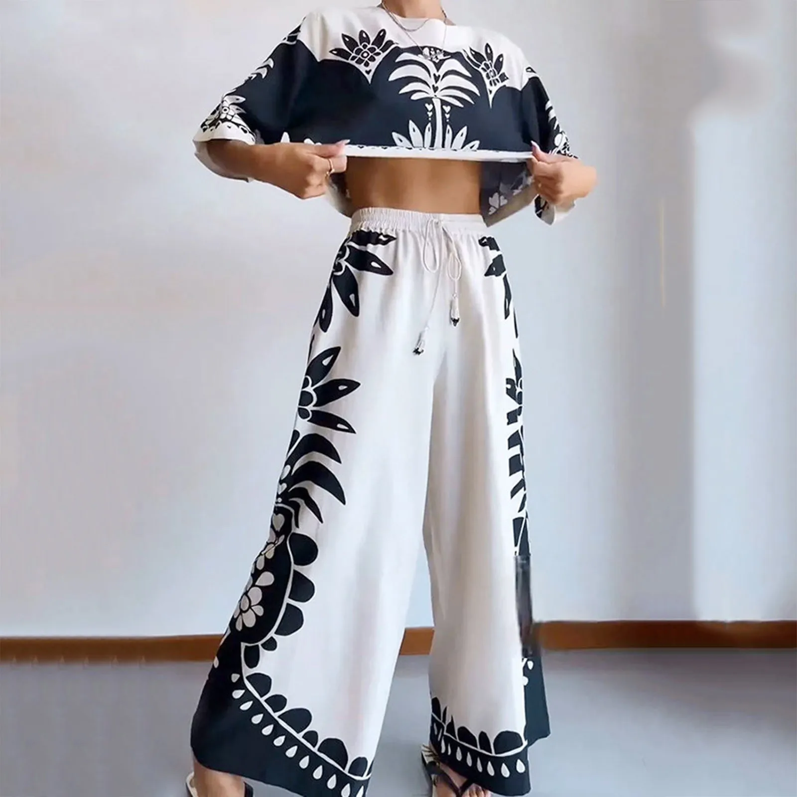 

Женский винтажный костюм в стиле бохо, футболка с круглым вырезом и рукавом до локтя, свободные брюки, комплект из 2 предметов, шикарная одежда для отпуска с эластичным поясом