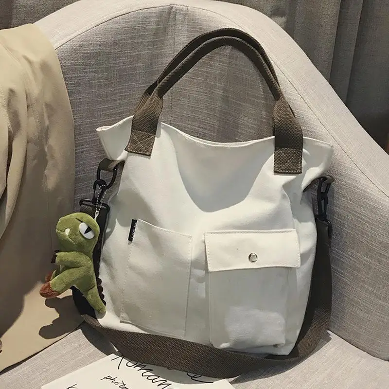 Korean Retro Fashion Minimalist Canvas Womens Handbag Large Capacity Leisure Student Commuting Shoulder Bag Trendy Crossbody Bag
Korean Retro Fashion Minimalist Canvas Womens Handbag Large Capacity Leisure Student Commuting Shoulder Bag Trendy Crossbody Bag