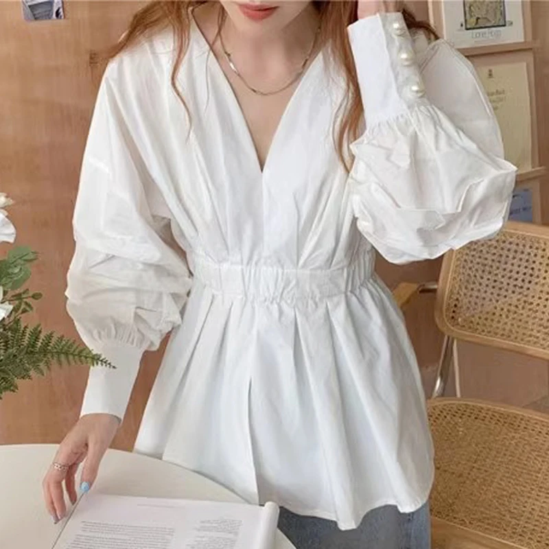 

SuperAen Korea Chic Autumn Niche V-neck Split Fold Waist Pearl Embellished Long-sleeved White Shirt Tops