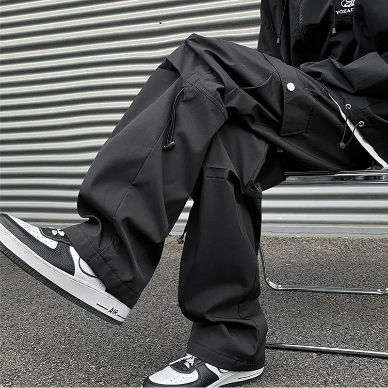 American high street overalls for men autumn trendy outdoor functional assault pants wide leg loose straight casual trousers y2k
American high street overalls for men autumn trendy outdoor functional assault pants wide leg loose straight casual trousers y2k