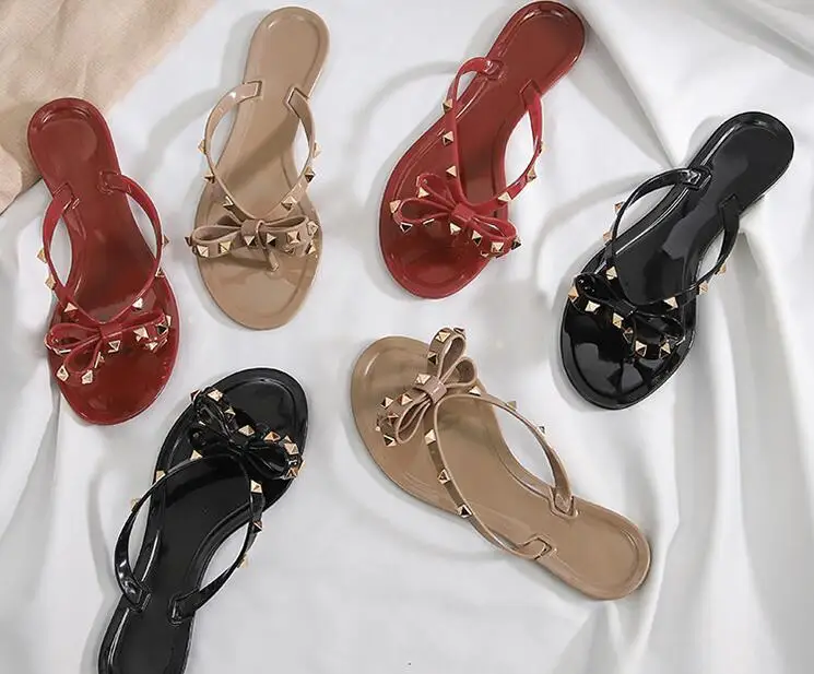 

PVC STUDDED BOW JELLY FLIP FLOP Designer Brand Summer Flip Flops Rivets Women Sandals Knot Flat Slippers Girl Beach Slides 35-40