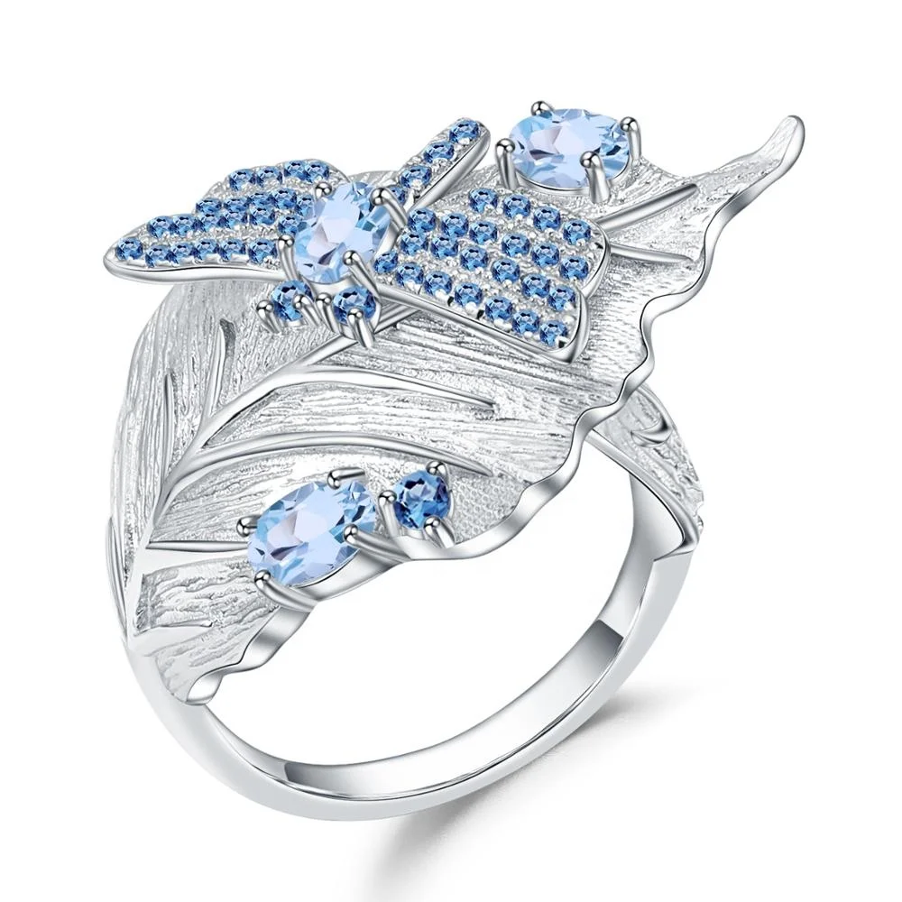 

Женское регулируемое кольцо из серебра 925 пробы с натуральным швейцарским голубым топазом и листьями насекомых