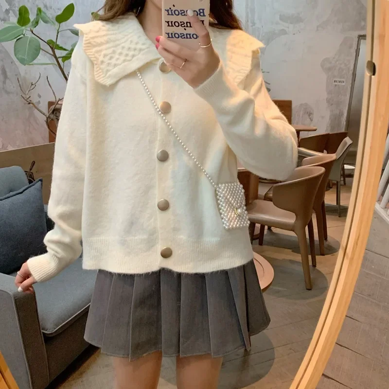 Loose All-Match Design Sense Doll Collar Sweater Autumn Winter Retro Japanese Style Thickened Sweater Cardigan Coat Women
Loose All-Match Design Sense Doll Collar Sweater Autumn Winter Retro Japanese Style Thickened Sweater Cardigan Coat Women