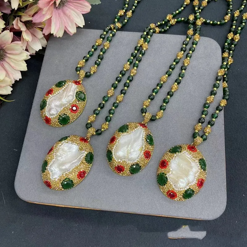 Пресноводный жемчуг барокко белый Оптовая Продажа Натуральные бусины FPPJ + Барокко Турмалин красный/зеленый циркон кулон ожерелье
Пресноводный жемчуг барокко белый Оптовая Продажа Натуральные бусины FPPJ + Барокко Турмалин красный/зеленый циркон кулон ожерелье