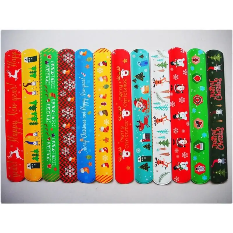 

12pcs New Christmas Slap Bracelets Penguin Pat Ring Bracelet Christmas Pat Ring PVC Wrist Band Childrens Toy Xmas Party Supplies