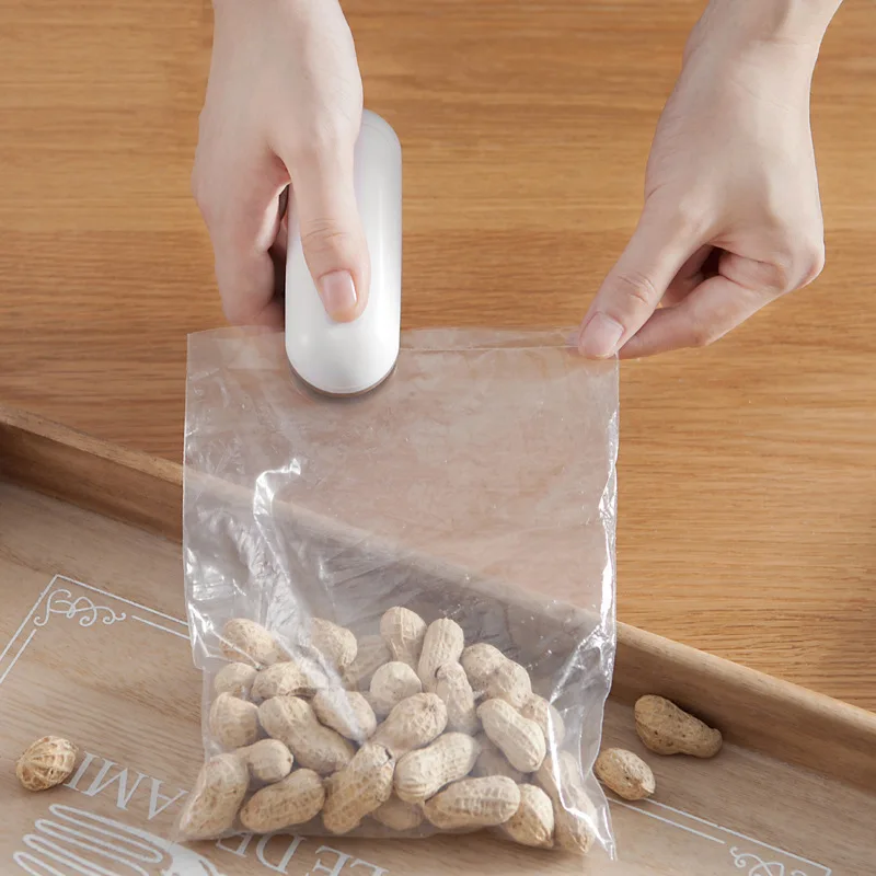 Portable Mini Snack Sealing Machine Household Hand Pressure Plastic Bag Food Preservation Plastic Sealing Machine
Portable Mini Snack Sealing Machine Household Hand Pressure Plastic Bag Food Preservation Plastic Sealing Machine