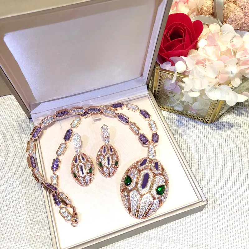 Designer Collection Style Earrings Necklace Inlay Purple Zircon Hollow Out Snake Pendant Serpent Snakelike Jewelry Sets
Designer Collection Style Earrings Necklace Inlay Purple Zircon Hollow Out Snake Pendant Serpent Snakelike Jewelry Sets