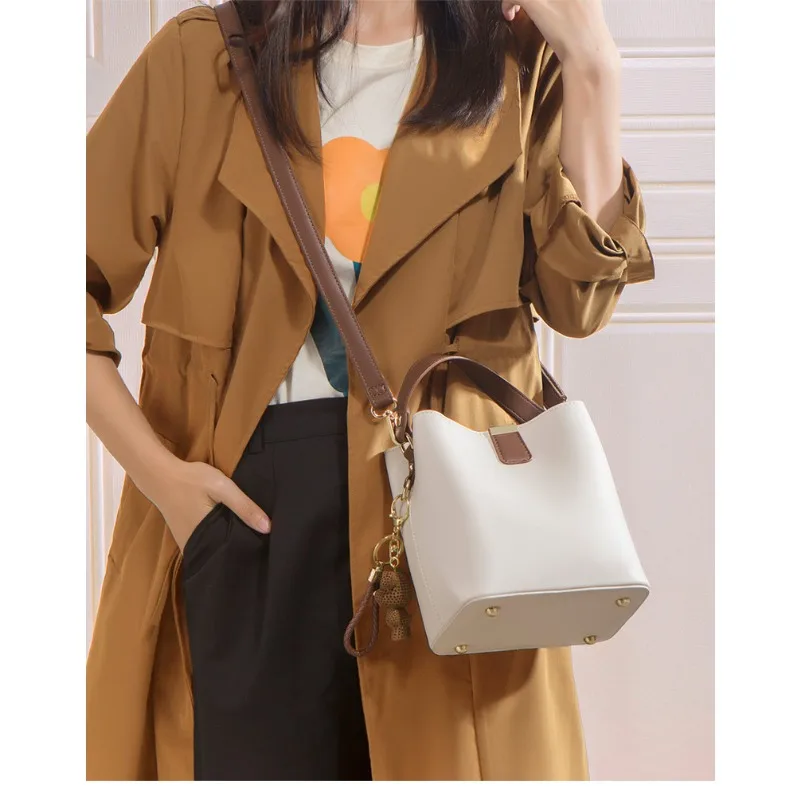 

Модная трендовая новая женская сумка-ведро, Высококачественная универсальная сумка через плечо, в западном стиле и элегантная ручная сумка через плечо, 2024