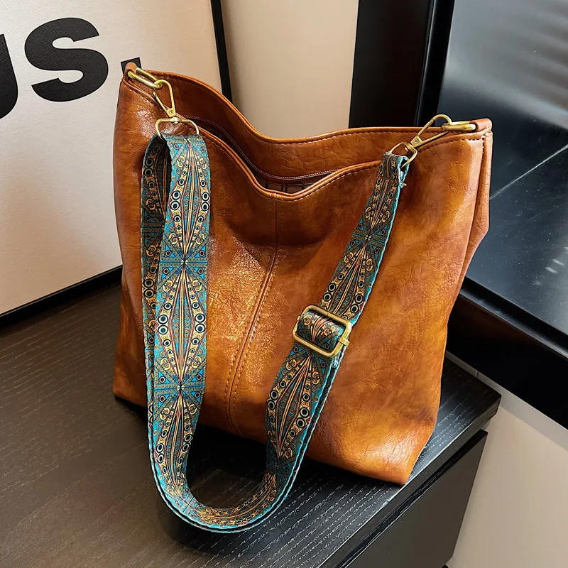 Vintage Solid Color PU Leather Shoulder Bags For Women Fashion Wide Strap Bucket Crossbody Bag Luxury Shoulder Sling Bag Purse
Vintage Solid Color PU Leather Shoulder Bags For Women Fashion Wide Strap Bucket Crossbody Bag Luxury Shoulder Sling Bag Purse