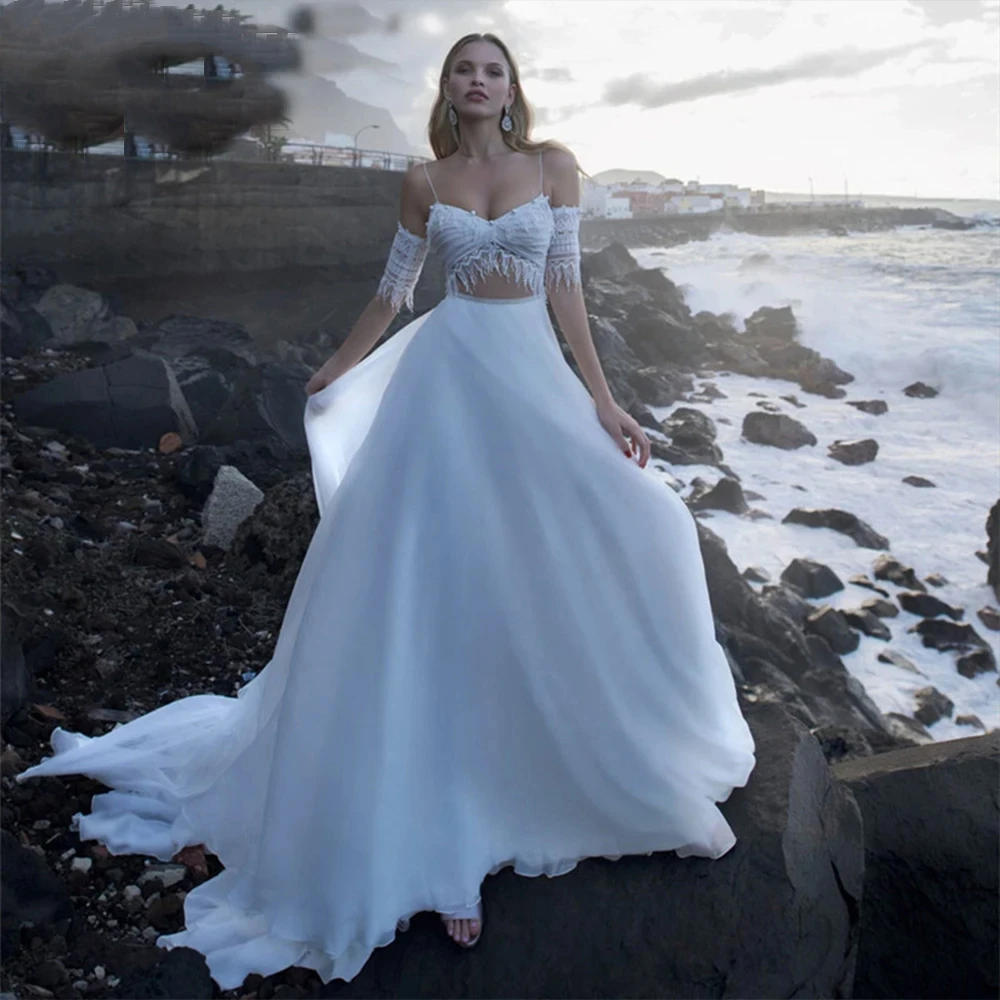 Elegant Two Pieces Pearls Tassel Boho Wedding Dress Beach Sexy V-Neck Open Back A-Line Lace Appliques Bridal Gowns Robe De Marié
Elegant Two Pieces Pearls Tassel Boho Wedding Dress Beach Sexy V-Neck Open Back A-Line Lace Appliques Bridal Gowns Robe De Marié