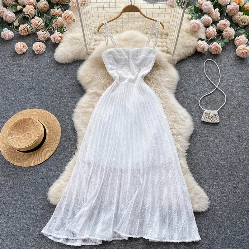 

Ordifree 2022 Summer Women Long Pleated Dress Spaghetti Strap Vintage Sexy Backless Vocation Tunic Beach Dress