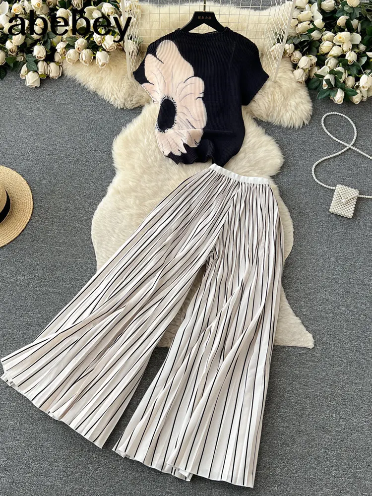 Women Print Pleated Wide Leg Pants 2 Piece Sets o-neck Short Sleeves Crop Tops Suits Summer female Floral Vacation Outfits
Women Print Pleated Wide Leg Pants 2 Piece Sets o-neck Short Sleeves Crop Tops Suits Summer female Floral Vacation Outfits
