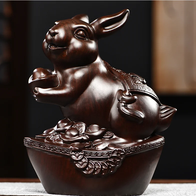 Feng Shui Decor Art Ebony Wood Carved Chinese Zodiac Rabbit Yuanbao Coin Statue
Feng Shui Decor Art Ebony Wood Carved Chinese Zodiac Rabbit Yuanbao Coin Statue