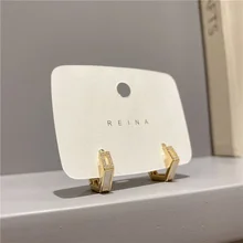 Korean fashion women's earrings micro-inlaid zircon geometric stud earrings golden polygonal earrings exquisite jewelry gifts
Korean fashion women's earrings micro-inlaid zircon geometric stud earrings golden polygonal earrings exquisite jewelry gifts
