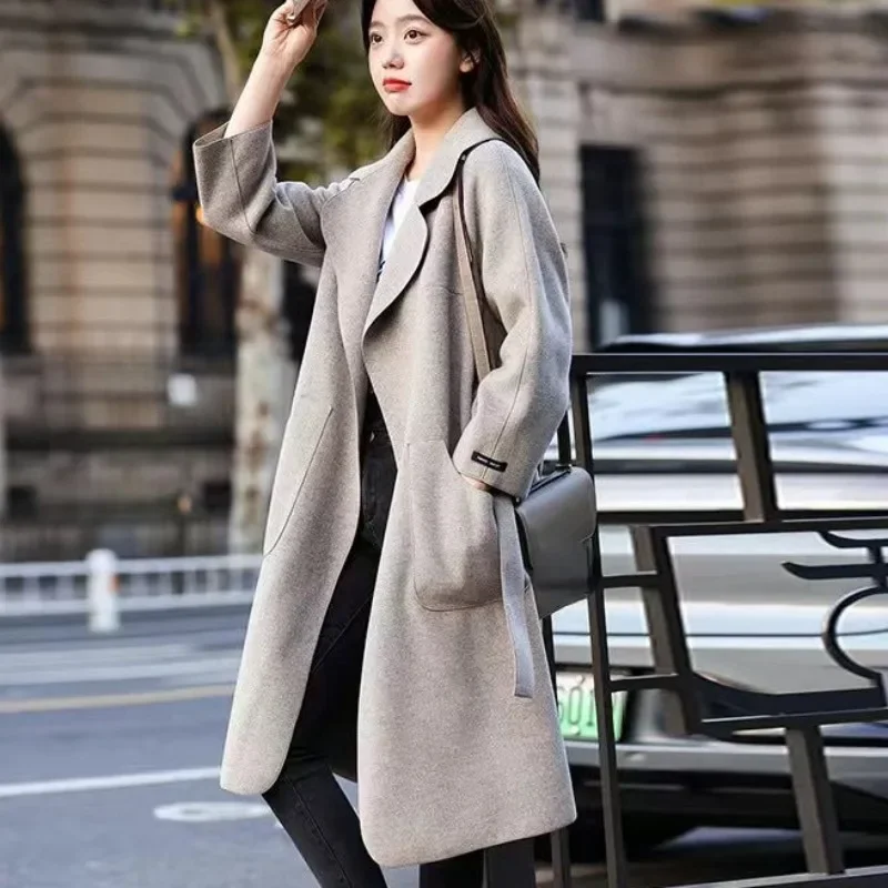 

2023 Winter Woolen Coat Women Korean Fashion Elegant Long Warm Thick Jacket Female Loose Covered Button Strap Blends Outwear