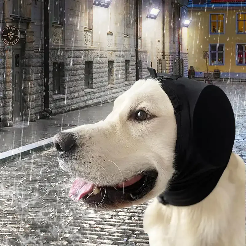 Dog Earmuffs | Noise Reduction Hearing Protection Preventing Stress Dogs A side profile of a light-colored Golden Retriever wearing black dog earmuffs while standing on a wet, cobblestone city street during a rainstorm. The earmuffs are sleek and form-fitting, designed to keep the dog