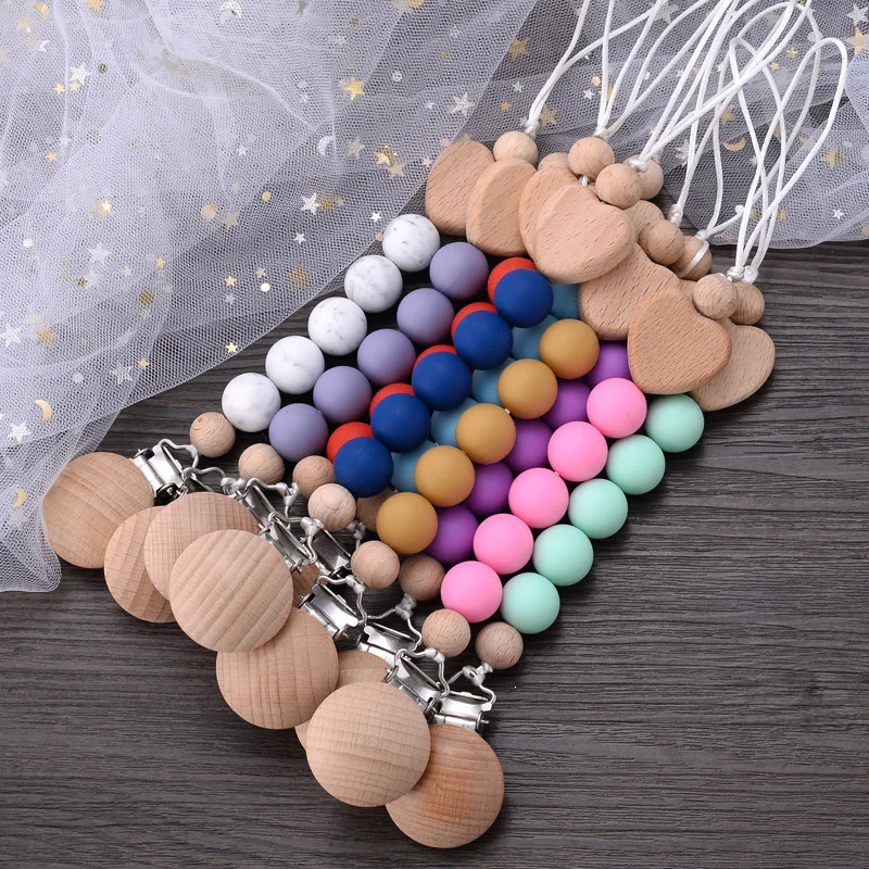 Baby Pacifier Clips Silicone Teething Beads Holder for Pacifiers Nipple Clip Chain Heart Wooden Beads Teethers Toy Accessories
Baby Pacifier Clips Silicone Teething Beads Holder for Pacifiers Nipple Clip Chain Heart Wooden Beads Teethers Toy Accessories