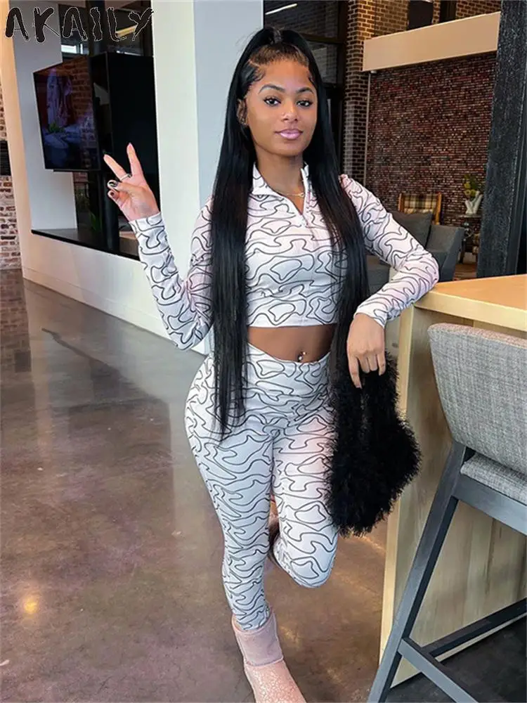 Akaily Black White Striped Print Two Piece Pants Set Streetwear Outfit For Women 2023 Fall Winter Long Sleeve Crop Top Pants Set 
Akaily Black White Striped Print Two Piece Pants Set Streetwear Outfit For Women 2023 Fall Winter Long Sleeve Crop Top Pants Set