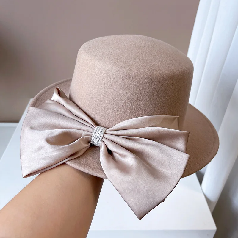 202312-dudu ins CHIC winter wool big bowknot pearl grace lady fedoras cap women leisure panama jazz hat
202312-dudu ins CHIC winter wool big bowknot pearl grace lady fedoras cap women leisure panama jazz hat
