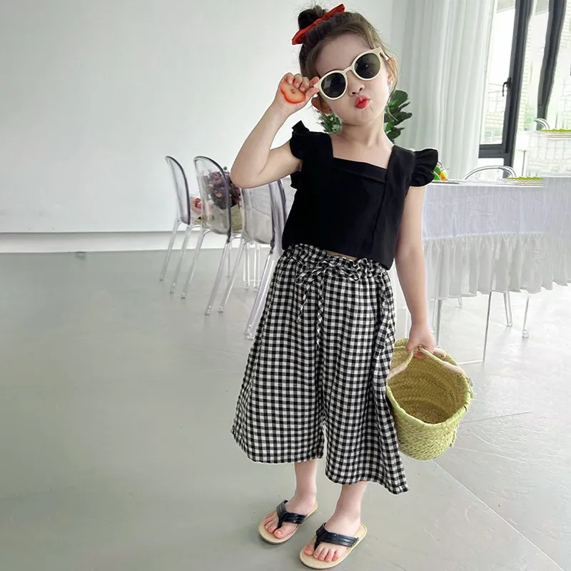 2Pcs Baby Girl Clothing Set Little Flying Sleeves Top And Plaid Wide Leg Pants Summer Korean Style Kids Outfit Children Clothing
2Pcs Baby Girl Clothing Set Little Flying Sleeves Top And Plaid Wide Leg Pants Summer Korean Style Kids Outfit Children Clothing